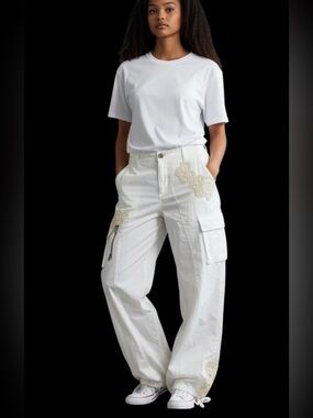 Boho White Cargo Pants with Crochet Appliqué Adjustable waist pants NWOT L.